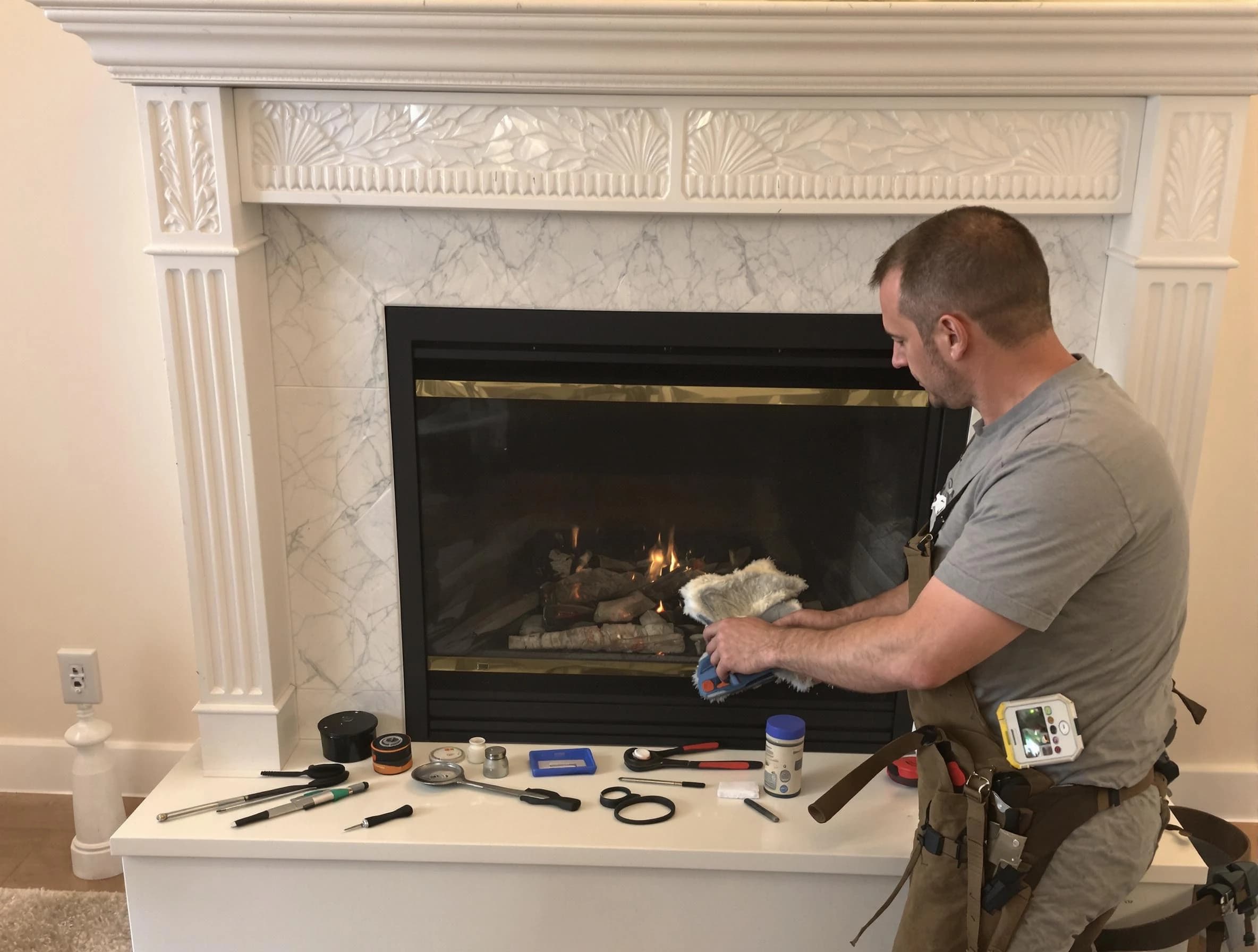 Jefferson Hills Chimney Sweep performing fireplace maintenance in Jefferson Hills, PA